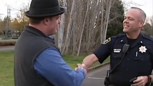 Shaking hands with the police